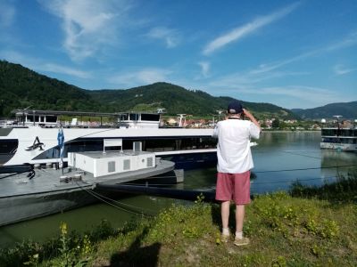 Fisherman checks the   Danube really  is  blue....
