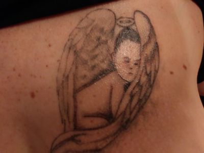 My wife's tattoo for the baby she lost
