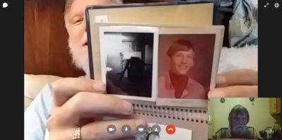 Roo's Kid Brother holding up a pic of roo from 1974 ( all in red )..lol
